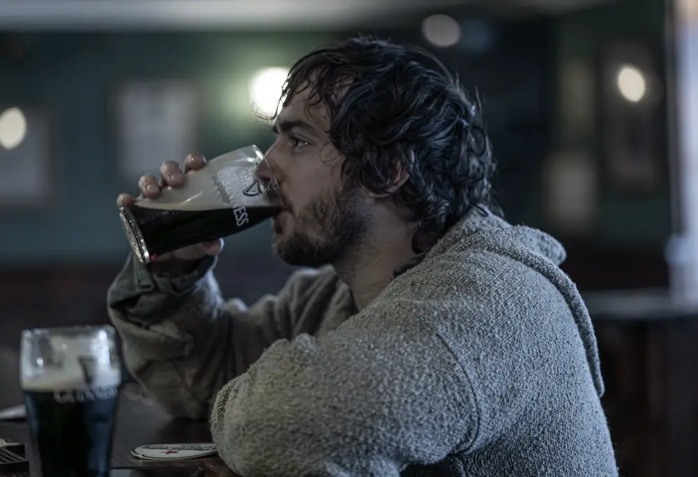 Man drinking Guinness in Ireland