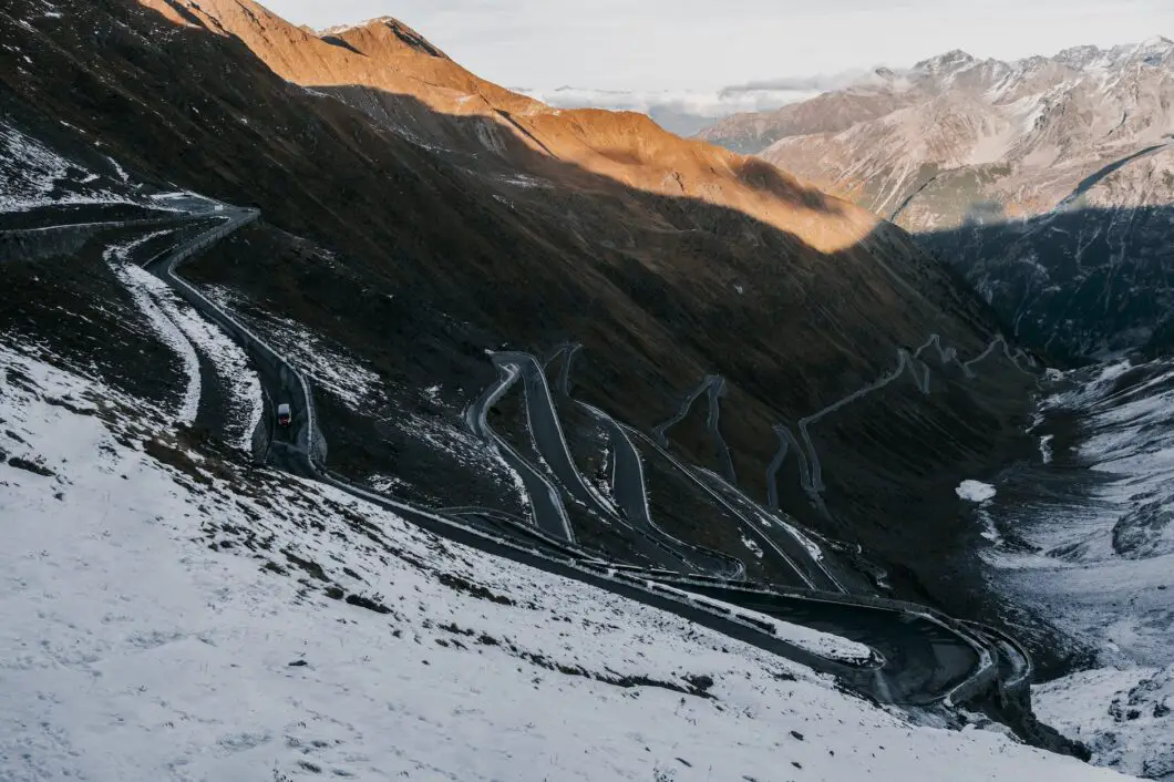 stelvio mountain pass with snow at bormio italy